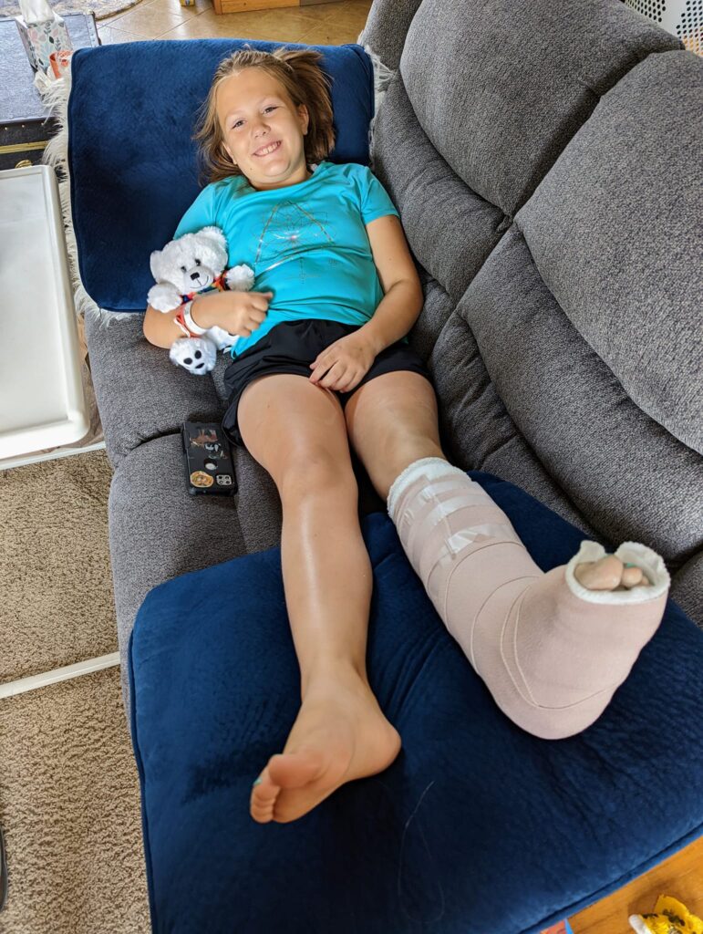 girl with cast on leg and foot