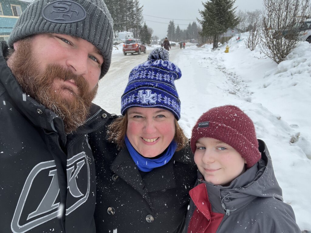 Williams family poses for a photo in the snow